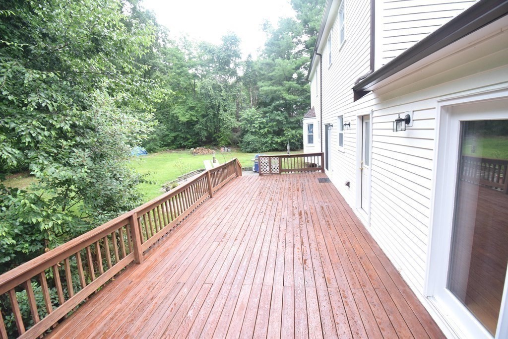 2 Mattakesett Circle Sharon, MA 02067 - Photo 40 of 40 a view of balcony with wooden floor and fence