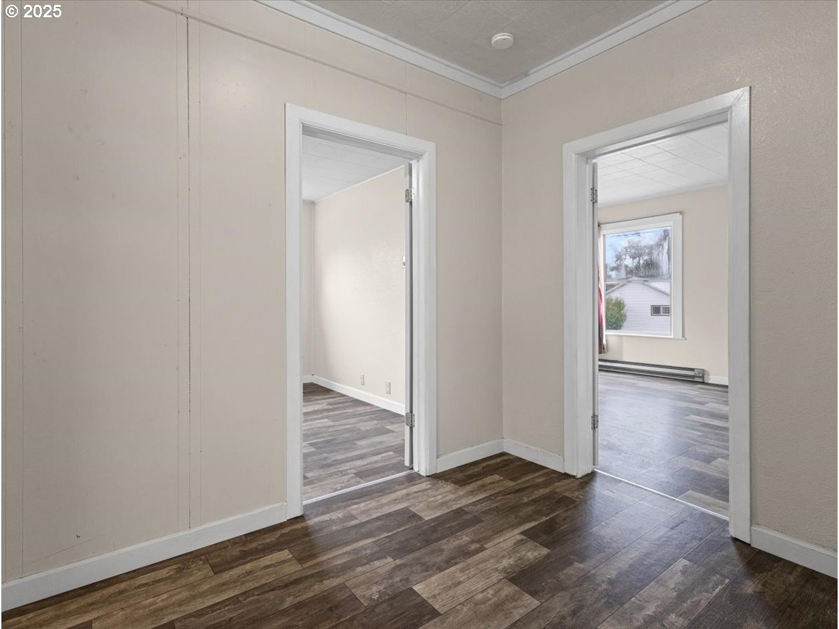 246 Jacobson Road Cathlamet, WA 98612 - Photo 15 of 33 a view of a hallway with wooden floor