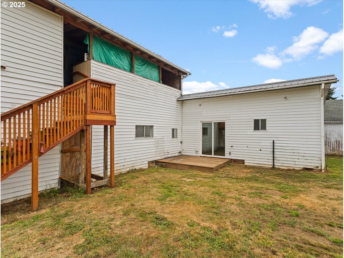 246 Jacobson Road Cathlamet, WA 98612 - Photo 23 of 33 a view of a house with a backyard