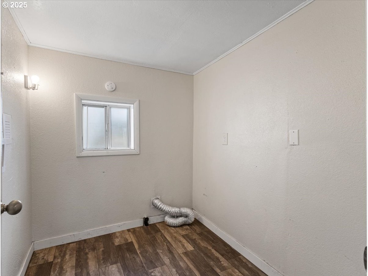 246 Jacobson Road Cathlamet, WA 98612 - Photo 9 of 33 a view of a room with wooden floor
