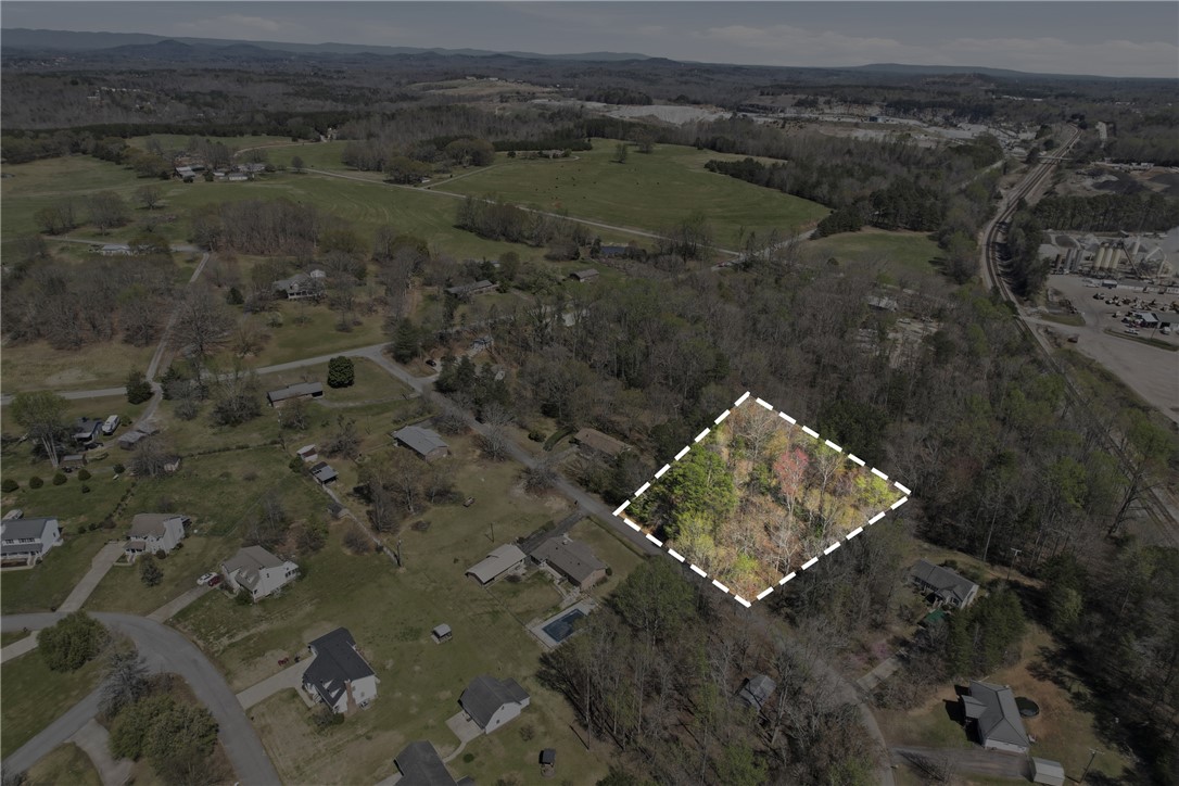 0 Springdale Avenue Liberty, SC 29657 - Photo 12 of 12 This aerial view showcases a desirable plot of land nestled among verdant trees.