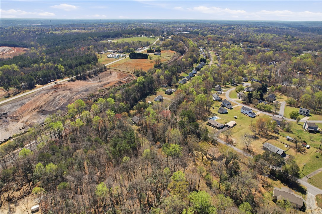 0 Springdale Avenue Liberty, SC 29657 - Photo 7 of 12 Expansive acreage provides a verdant backdrop for future possibilities.