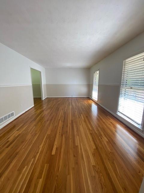 5262 Happy Hollow Road Atlanta, GA 30360 - Photo 13 of 18 a view of empty room with wooden floor