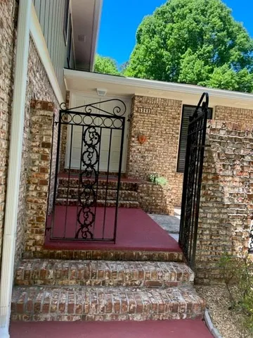 a view of a pathway with a bench