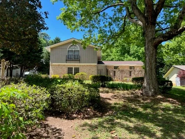 a house view with a outdoor space