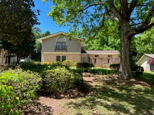 5262 Happy Hollow Road Atlanta, GA 30360 - Photo 5 of 18 a house view with a outdoor space