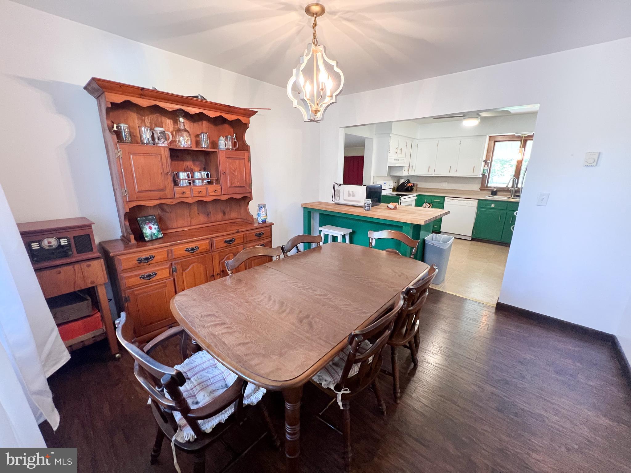 34 Cayuga Road Belleville, PA 17004 - Photo 13 of 46 a view of a dining room with furniture window and wooden floor