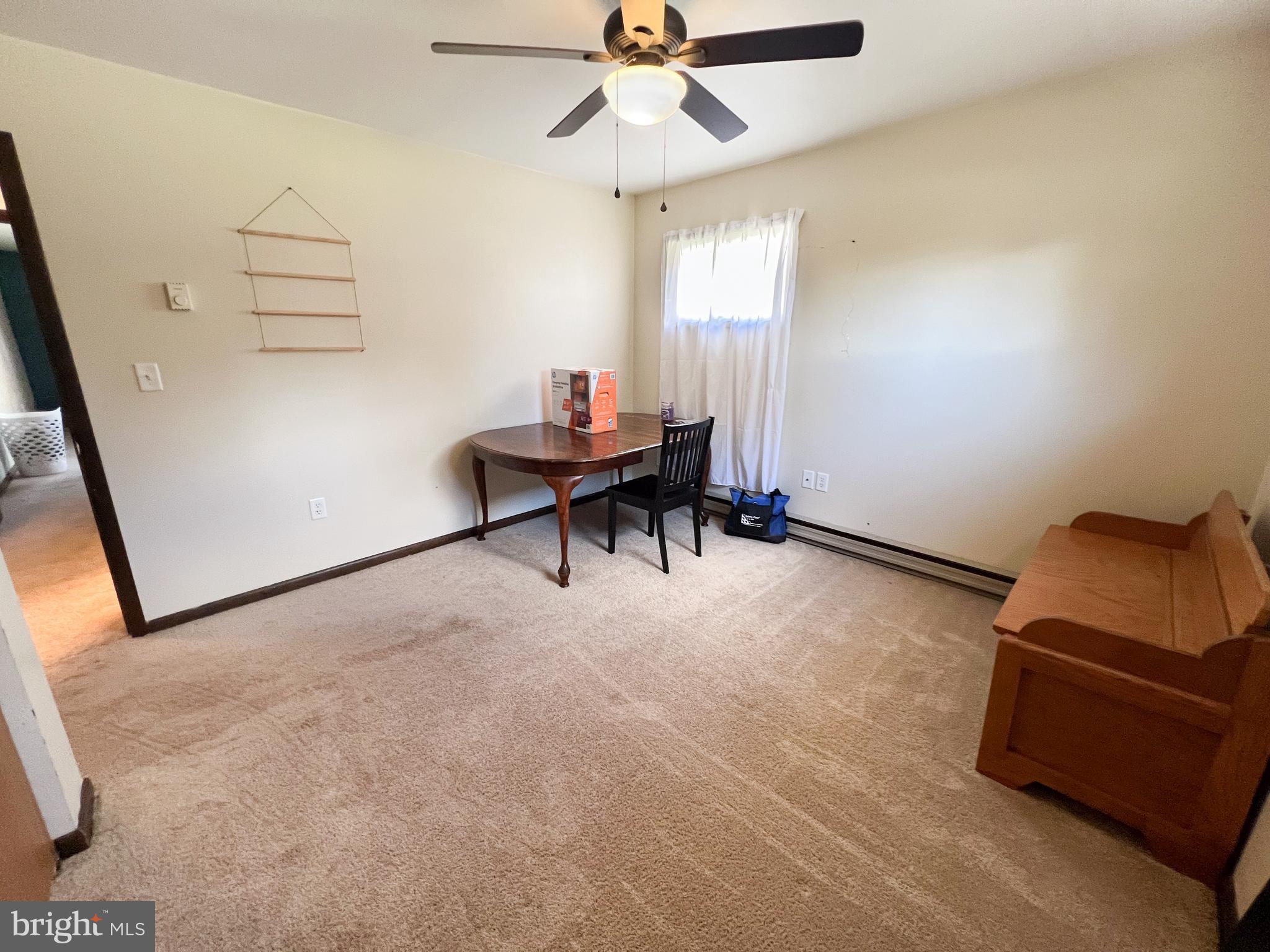 34 Cayuga Road Belleville, PA 17004 - Photo 20 of 46 a living room with furniture and a window