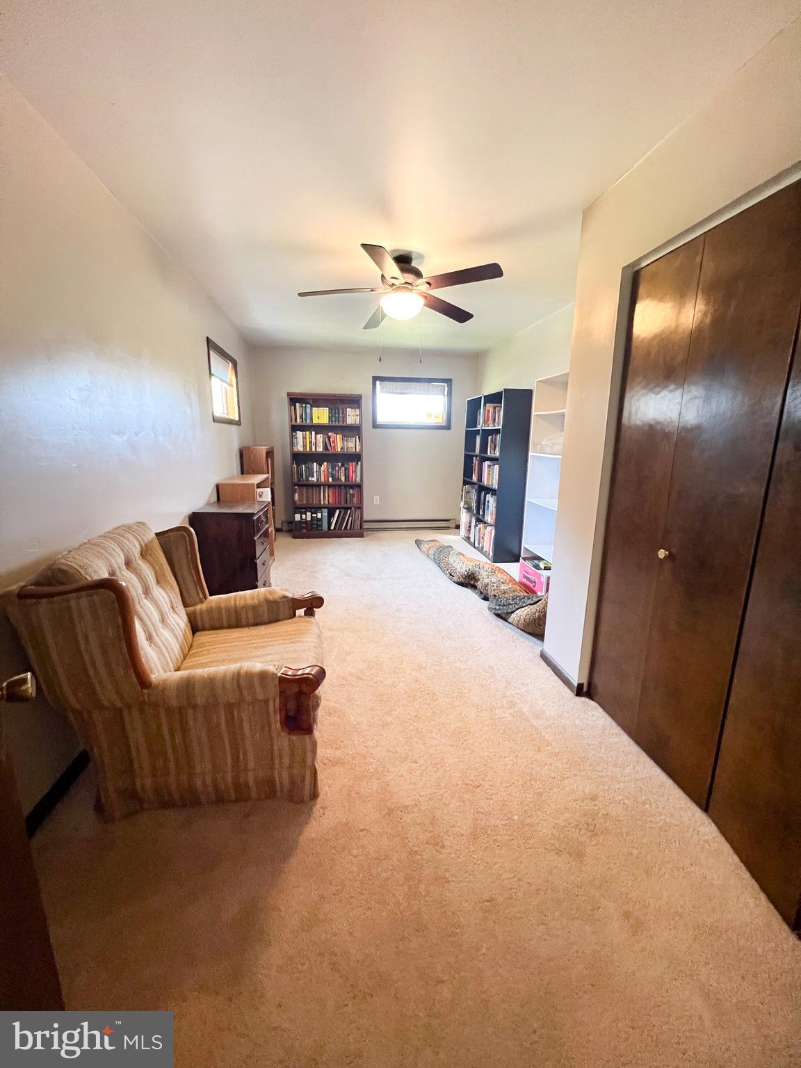 34 Cayuga Road Belleville, PA 17004 - Photo 21 of 46 a bed room with furniture and a large mirror