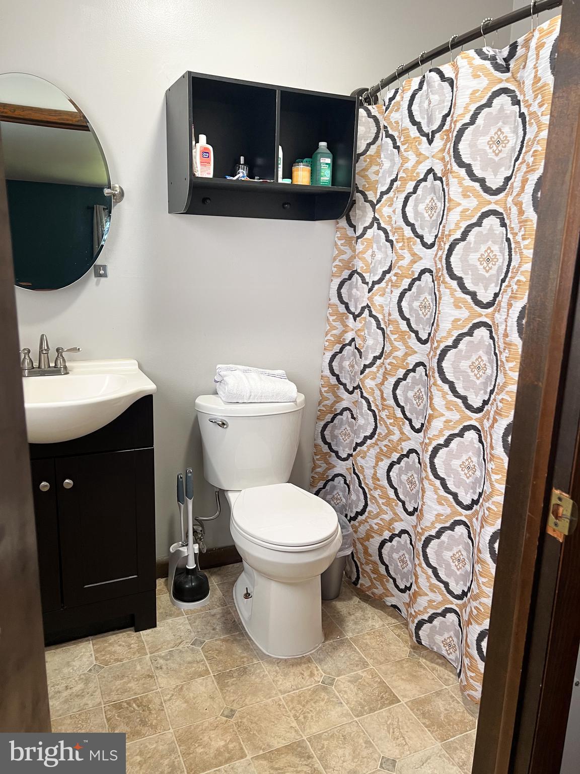 34 Cayuga Road Belleville, PA 17004 - Photo 30 of 46 a bathroom with a toilet sink and mirror