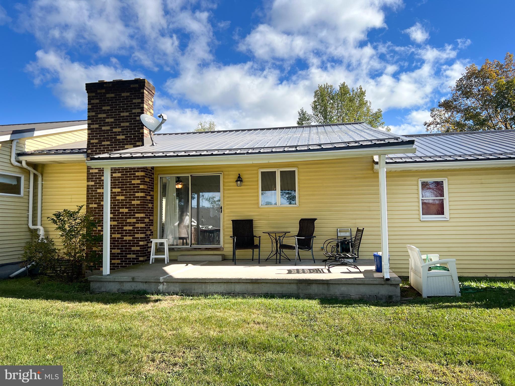 34 Cayuga Road Belleville, PA 17004 - Photo 42 of 46 a view of a house with backyard porch and sitting area