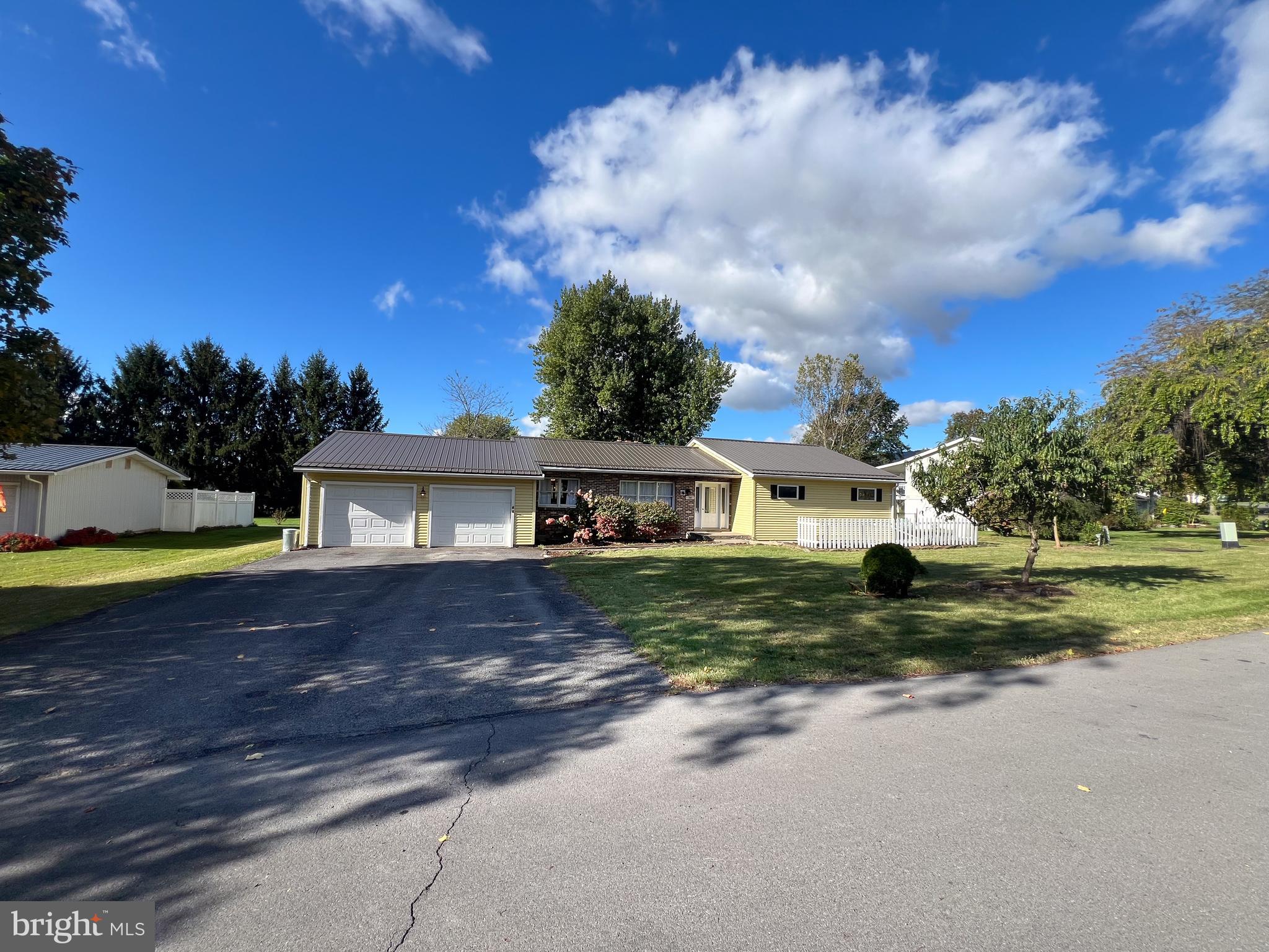 34 Cayuga Road Belleville, PA 17004 - Photo 45 of 46 a view of a house with a yard and large tree