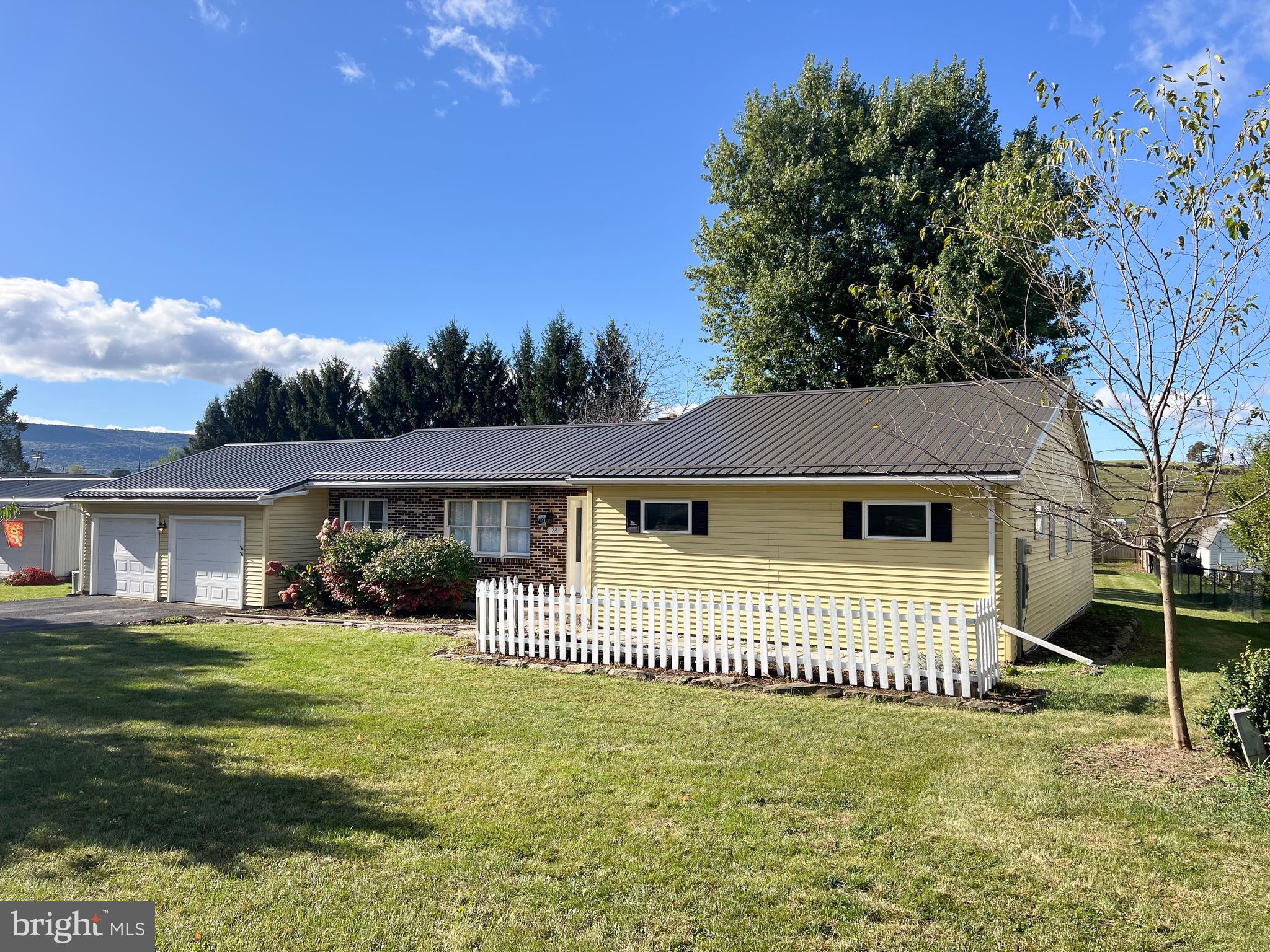34 Cayuga Road Belleville, PA 17004 - Photo 46 of 46 front view of a house with a yard