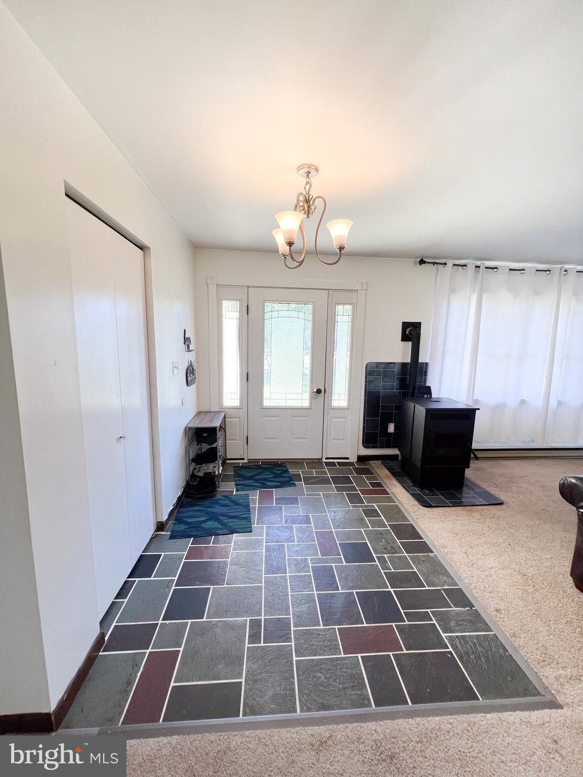 34 Cayuga Road Belleville, PA 17004 - Photo 6 of 46 a living room with furniture and a rug