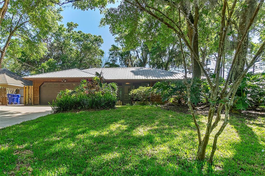 221 Queen Road St. Augustine, FL 32086 - Photo 1 of 1 a view of backyard with green space