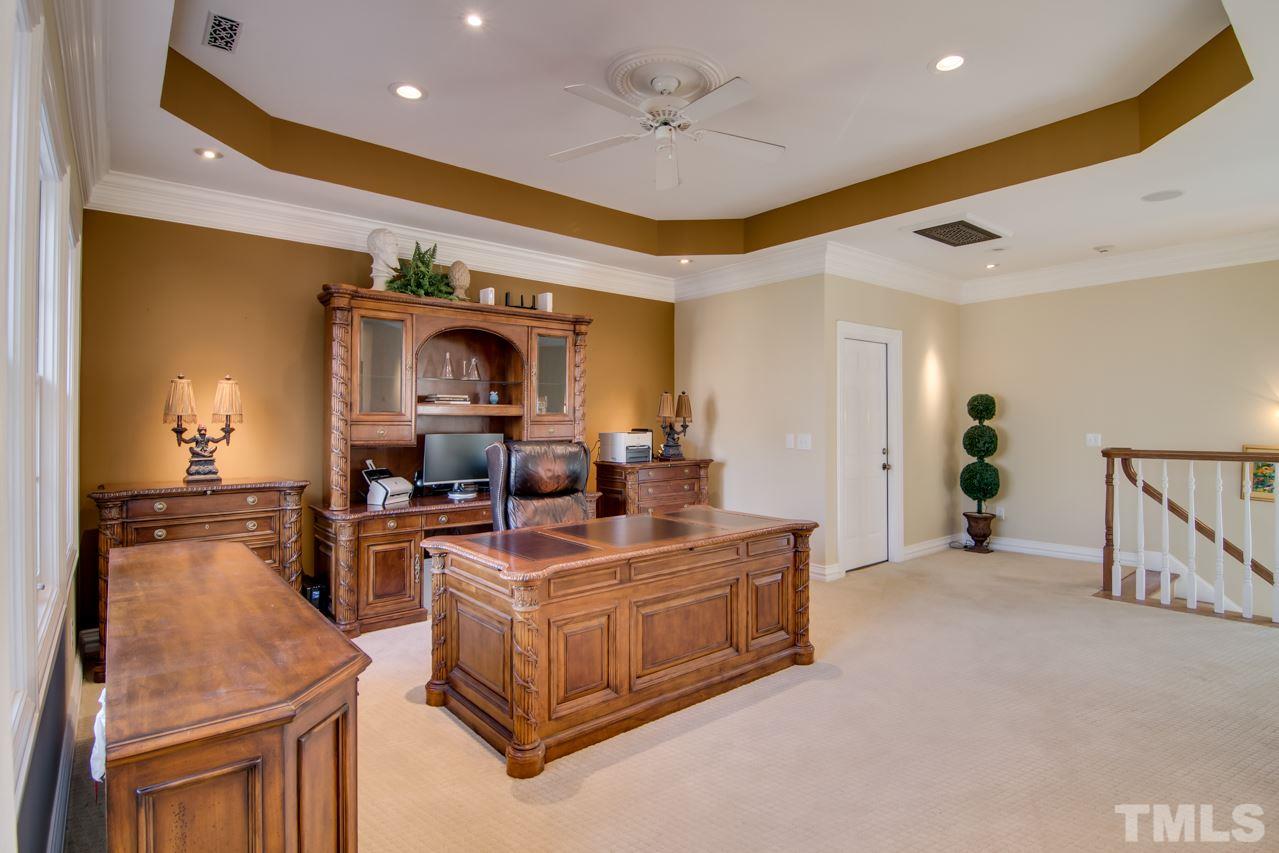 824 Rivers Edge Drive Graham, NC 27253 - Photo 20 of 30 a view of living room with furniture and a chandelier