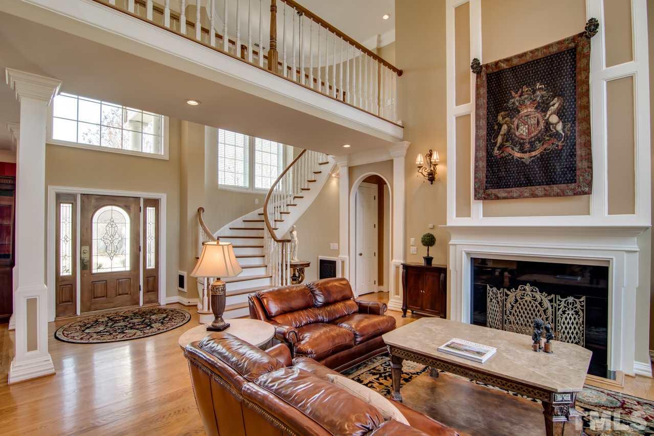 824 Rivers Edge Drive Graham, NC 27253 - Photo 3 of 30 a living room with furniture and a fireplace