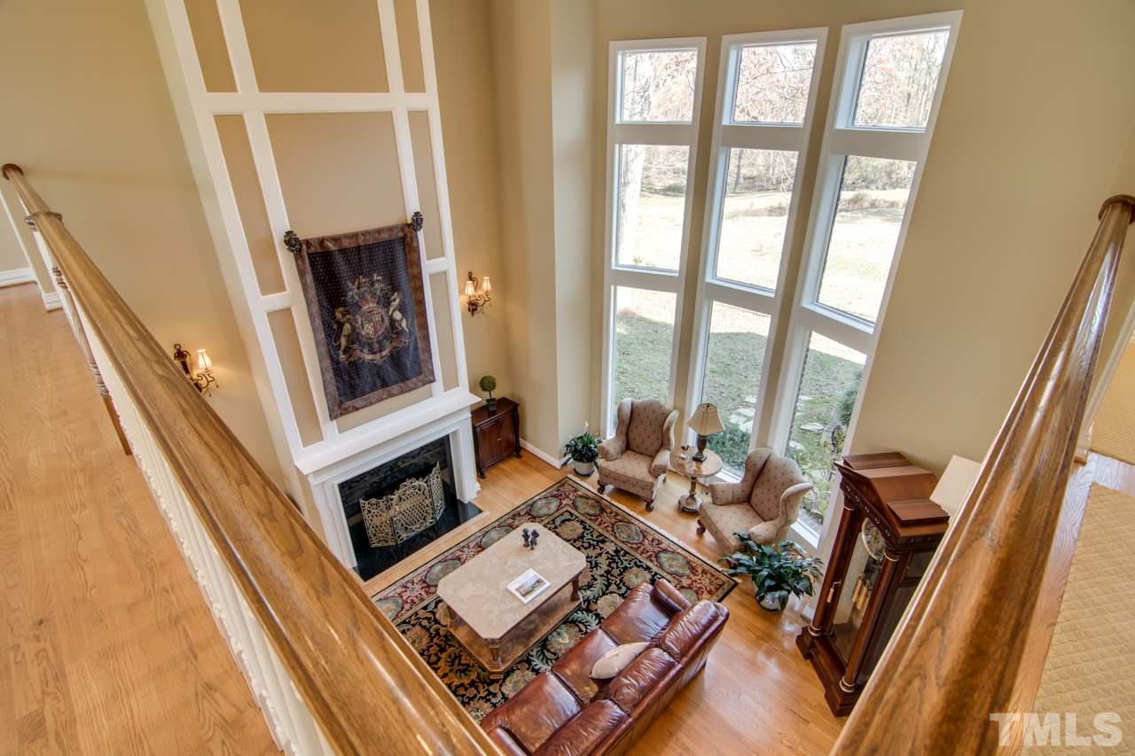 824 Rivers Edge Drive Graham, NC 27253 - Photo 25 of 30 a living room with furniture and a fireplace
