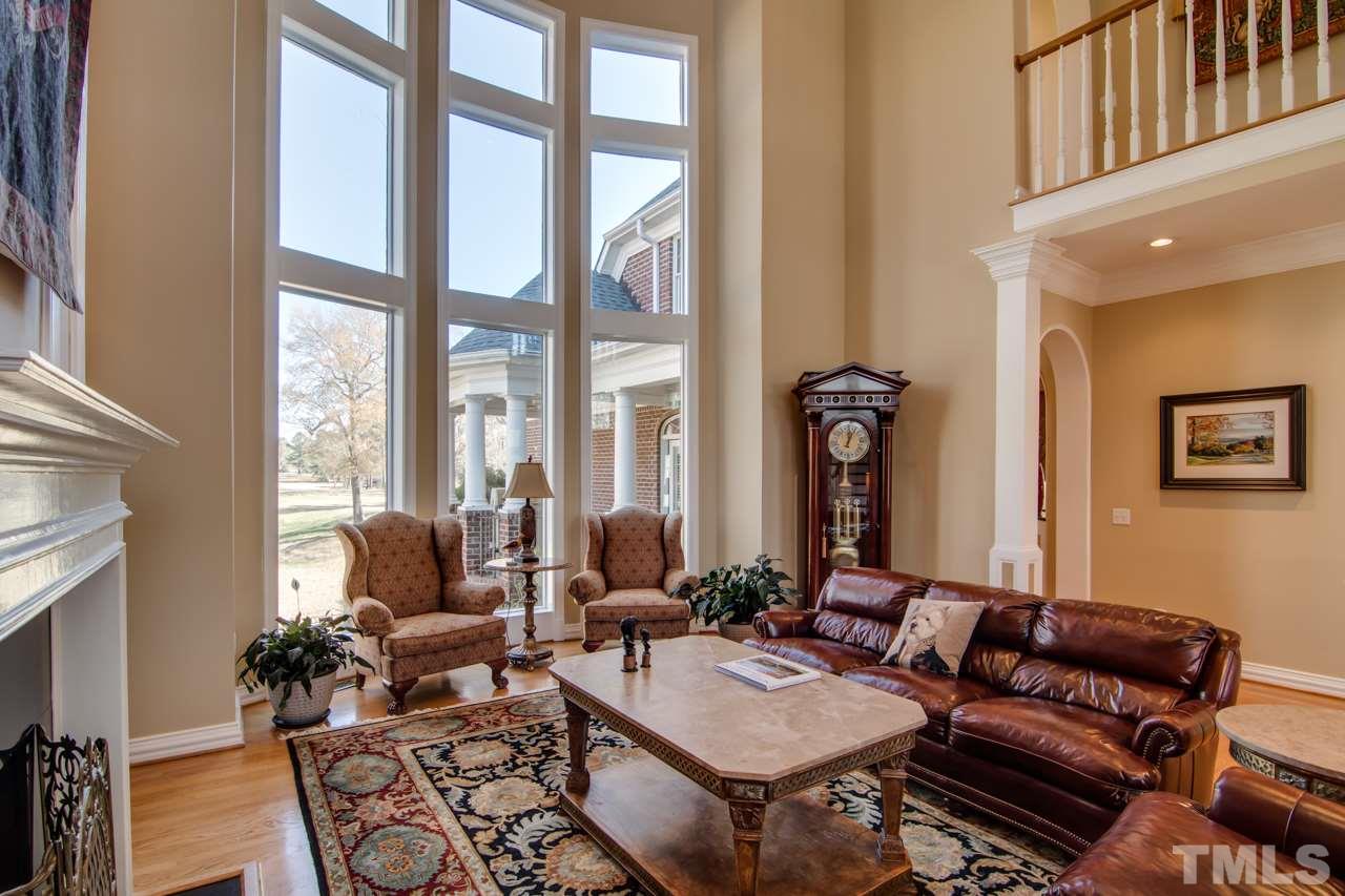 824 Rivers Edge Drive Graham, NC 27253 - Photo 5 of 30 a living room with furniture and a large window