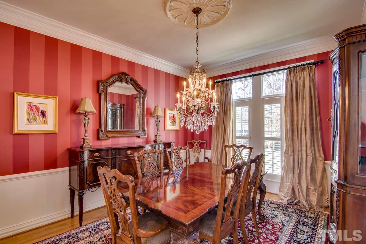 824 Rivers Edge Drive Graham, NC 27253 - Photo 6 of 30 a view of a dining room with furniture window and wooden floor