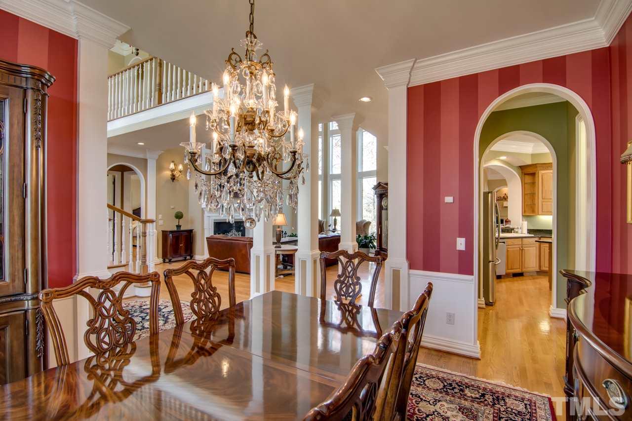 824 Rivers Edge Drive Graham, NC 27253 - Photo 7 of 30 a view of a dining room with furniture window and wooden floor