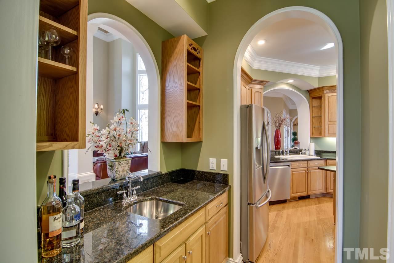 824 Rivers Edge Drive Graham, NC 27253 - Photo 8 of 30 a kitchen with a sink and a stove top oven