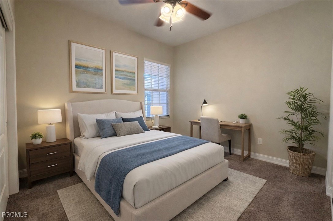 13071 Sandy Key Bend, Unit 304 North Fort Myers, FL 33903 - Photo 22 of 37 a bedroom with a bed and a potted plant