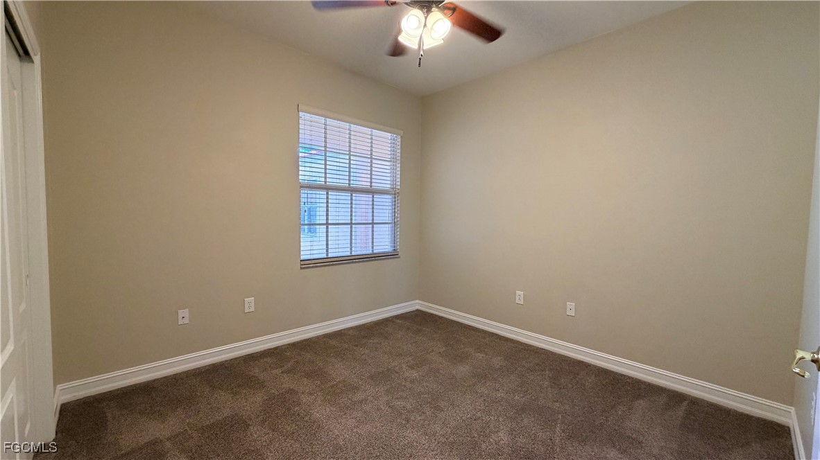 13071 Sandy Key Bend, Unit 304 North Fort Myers, FL 33903 - Photo 23 of 37 an empty room with a window