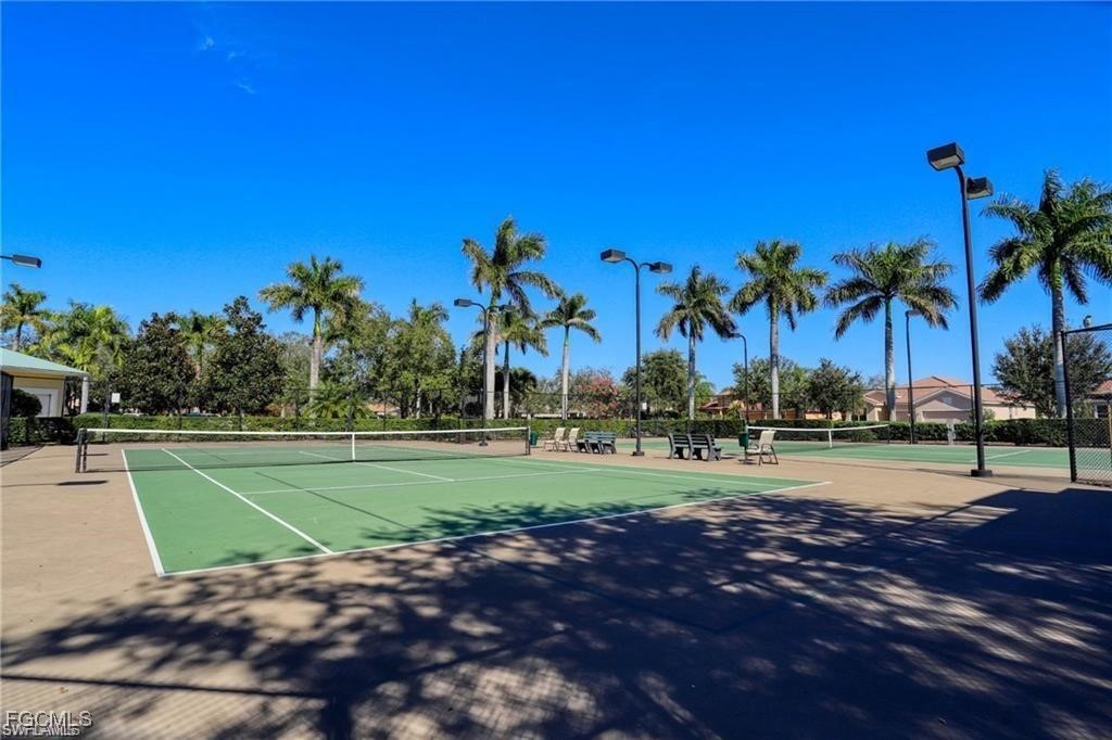 13071 Sandy Key Bend, Unit 304 North Fort Myers, FL 33903 - Photo 37 of 37 a view of an outdoor space and swimming pool