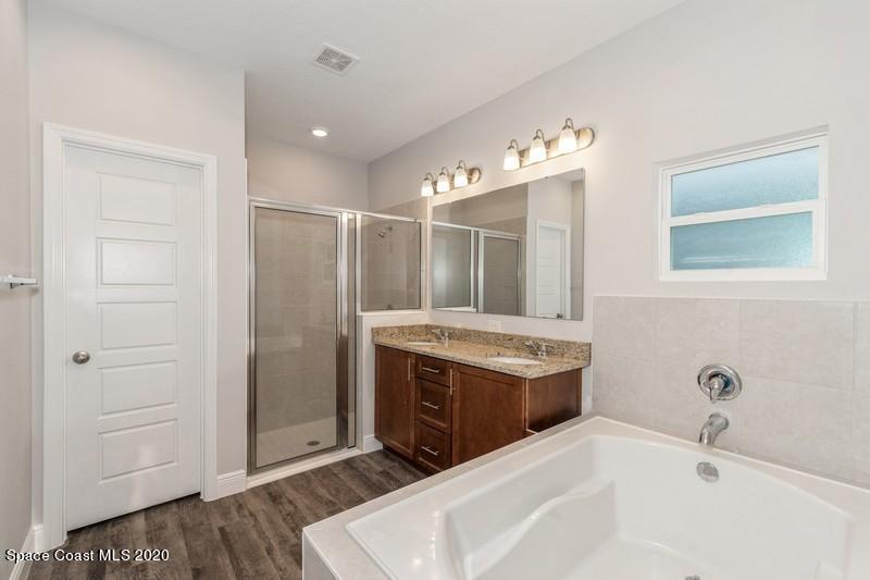 3223 Telesca Road Southeast Palm Bay, FL 32909 - Photo 12 of 17 11_1462LeewardAvenue_13_PrimaryBathroom_