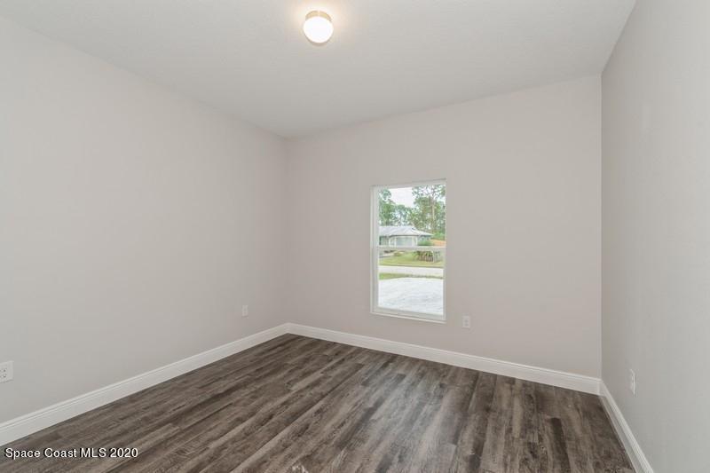 3223 Telesca Road Southeast Palm Bay, FL 32909 - Photo 14 of 17 13_1462LeewardAvenue_154_3rdBedroom_Flex