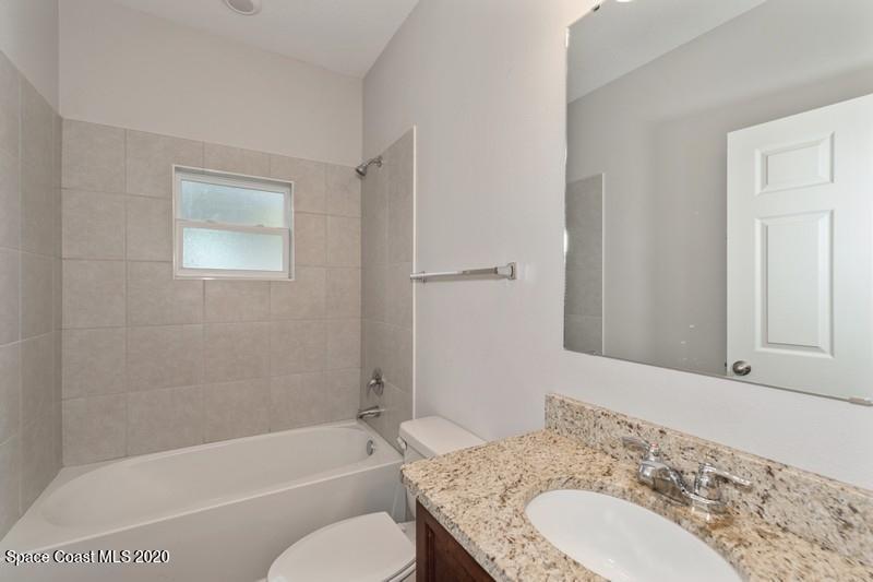 3223 Telesca Road Southeast Palm Bay, FL 32909 - Photo 15 of 17 14_1462LeewardAvenue_8_Bathroom_FlexMLS8