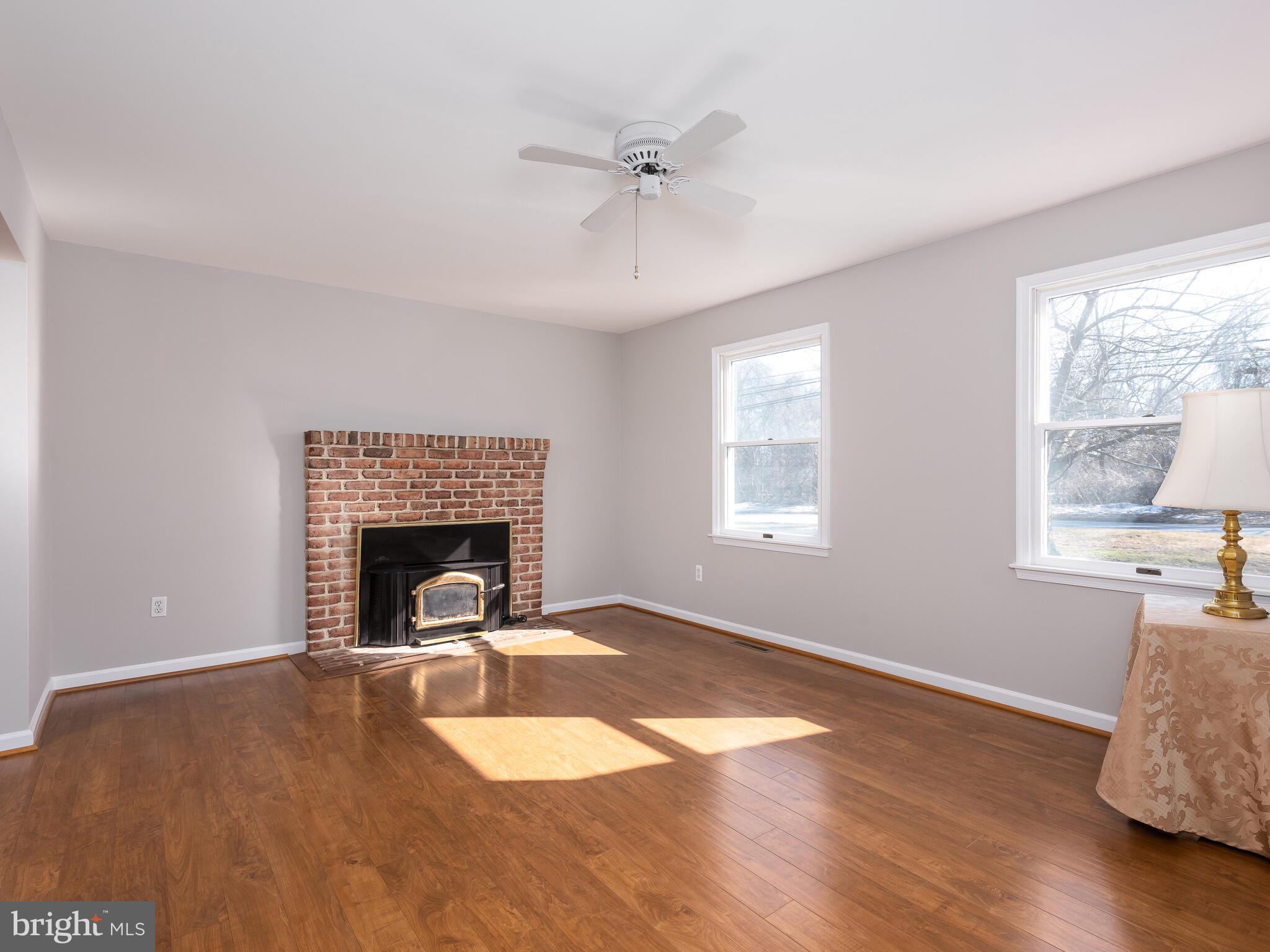 855 Highspire Road Glenmoore, PA 19343 - Photo 16 of 45 LR w wood burning fireplace w stove insert