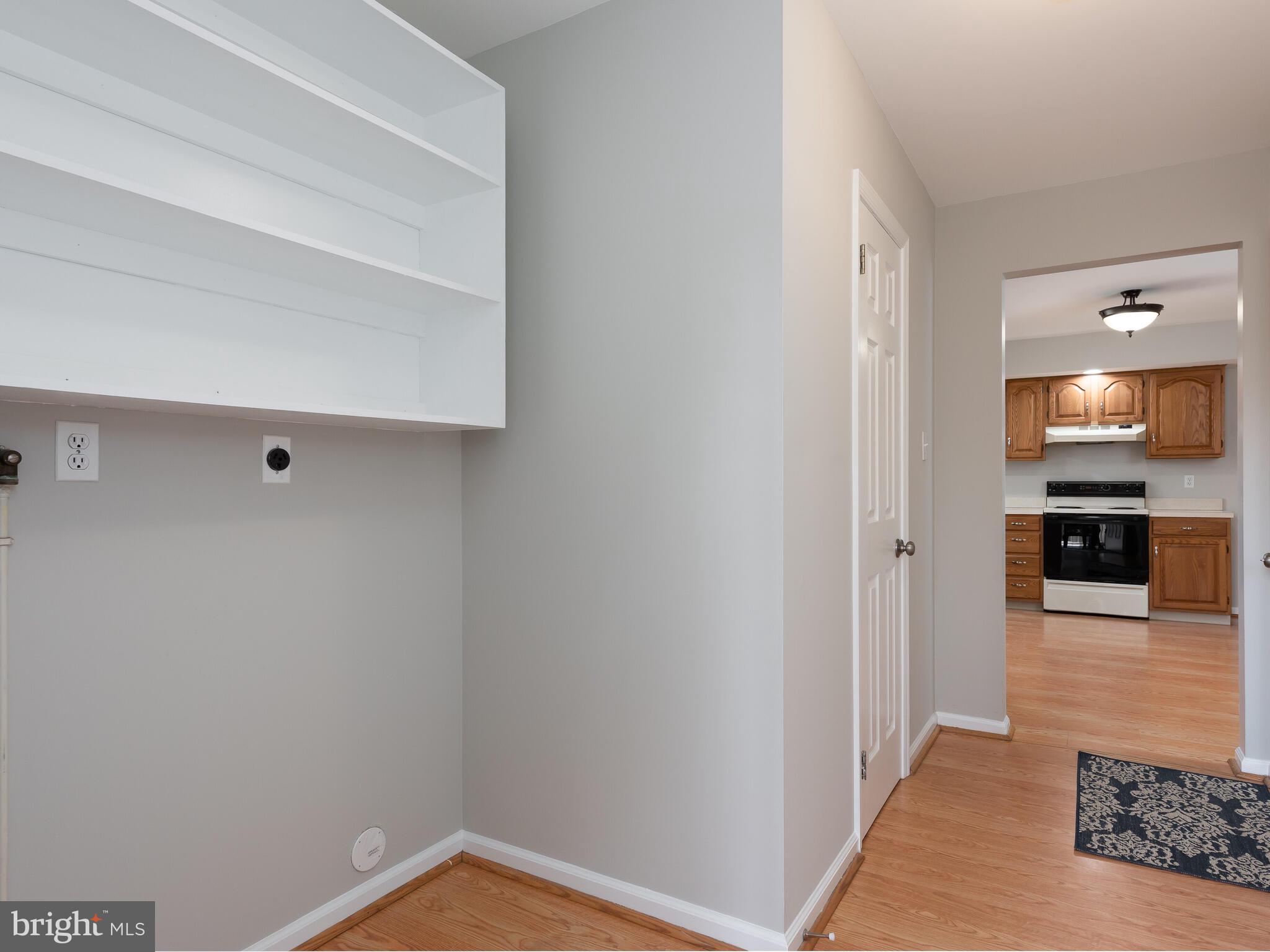 855 Highspire Road Glenmoore, PA 19343 - Photo 33 of 45 Laundry/Mud RM w shelves, looking to Kitchen