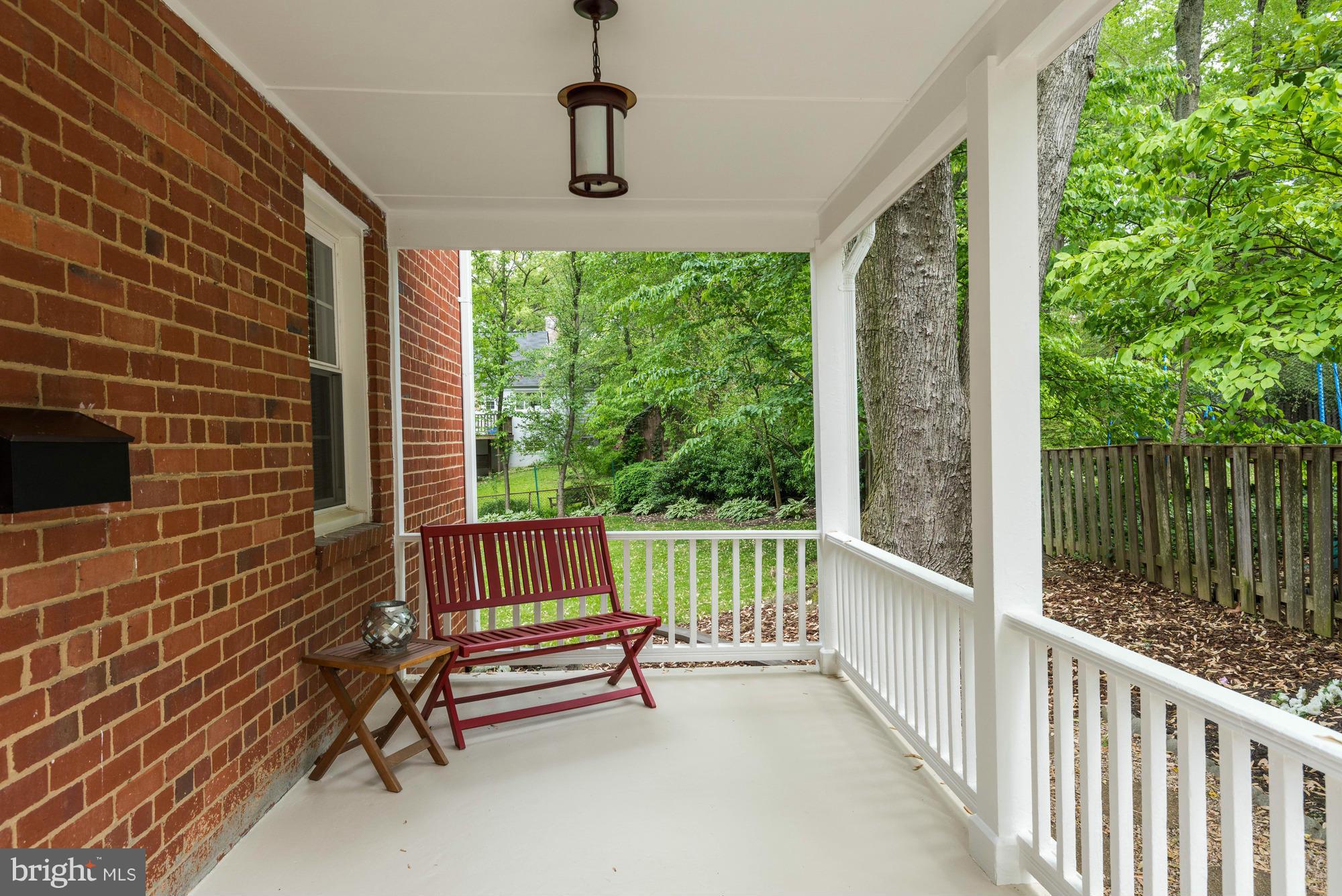 9109 Eton Road Silver Spring, MD 20901 - Photo 2 of 30 a view of porch with a bench