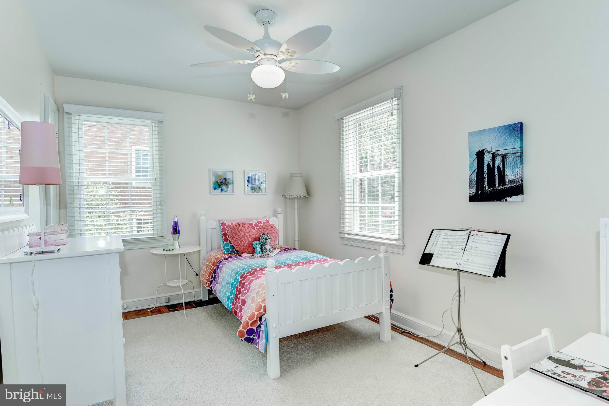 9109 Eton Road Silver Spring, MD 20901 - Photo 13 of 30 a bedroom with a bed and a window