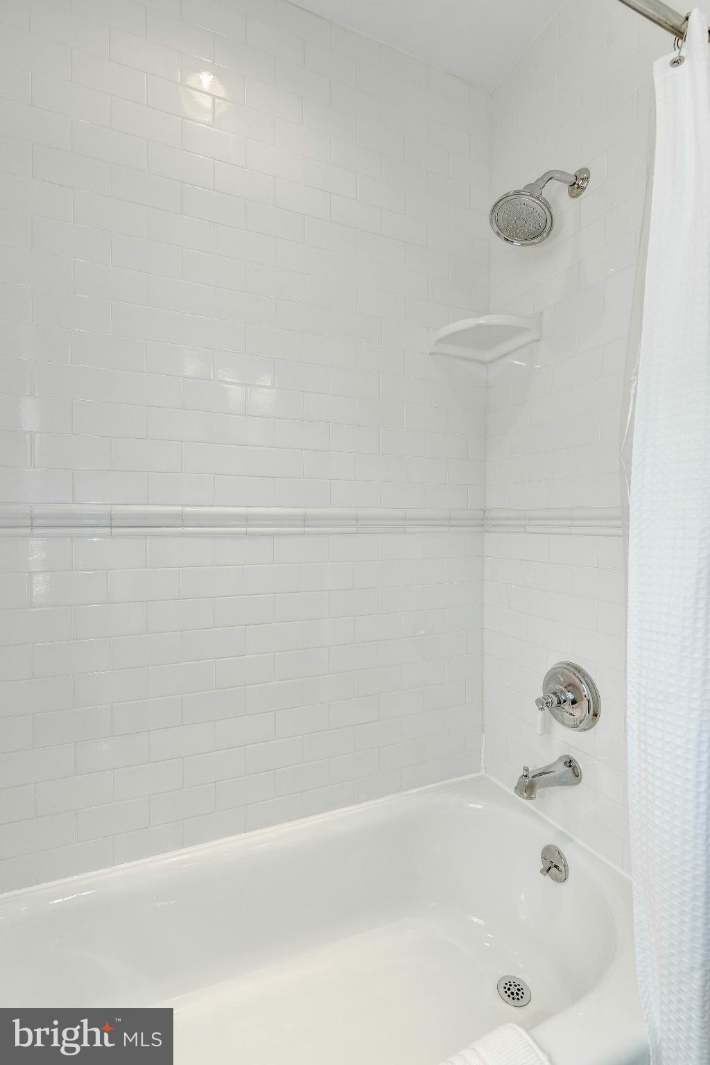 9109 Eton Road Silver Spring, MD 20901 - Photo 17 of 30 a bathroom with a bathtub