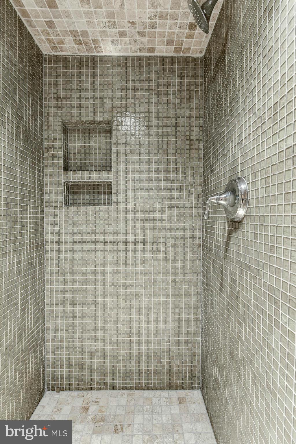 9109 Eton Road Silver Spring, MD 20901 - Photo 22 of 30 a bathroom with a shower