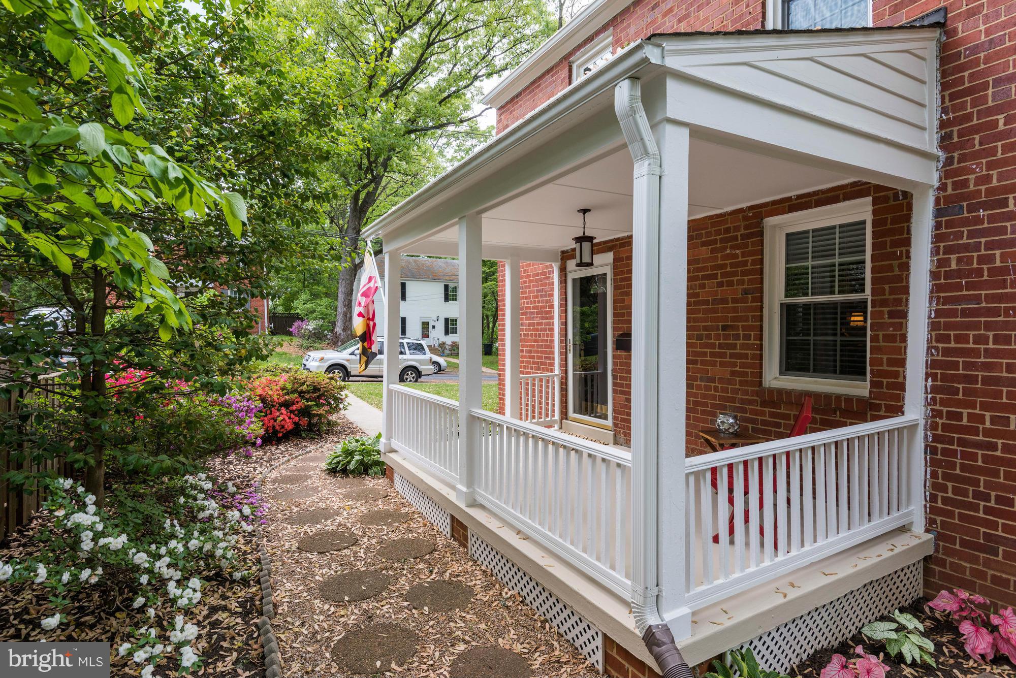 9109 Eton Road Silver Spring, MD 20901 - Photo 25 of 30 a view of a porch with a garden