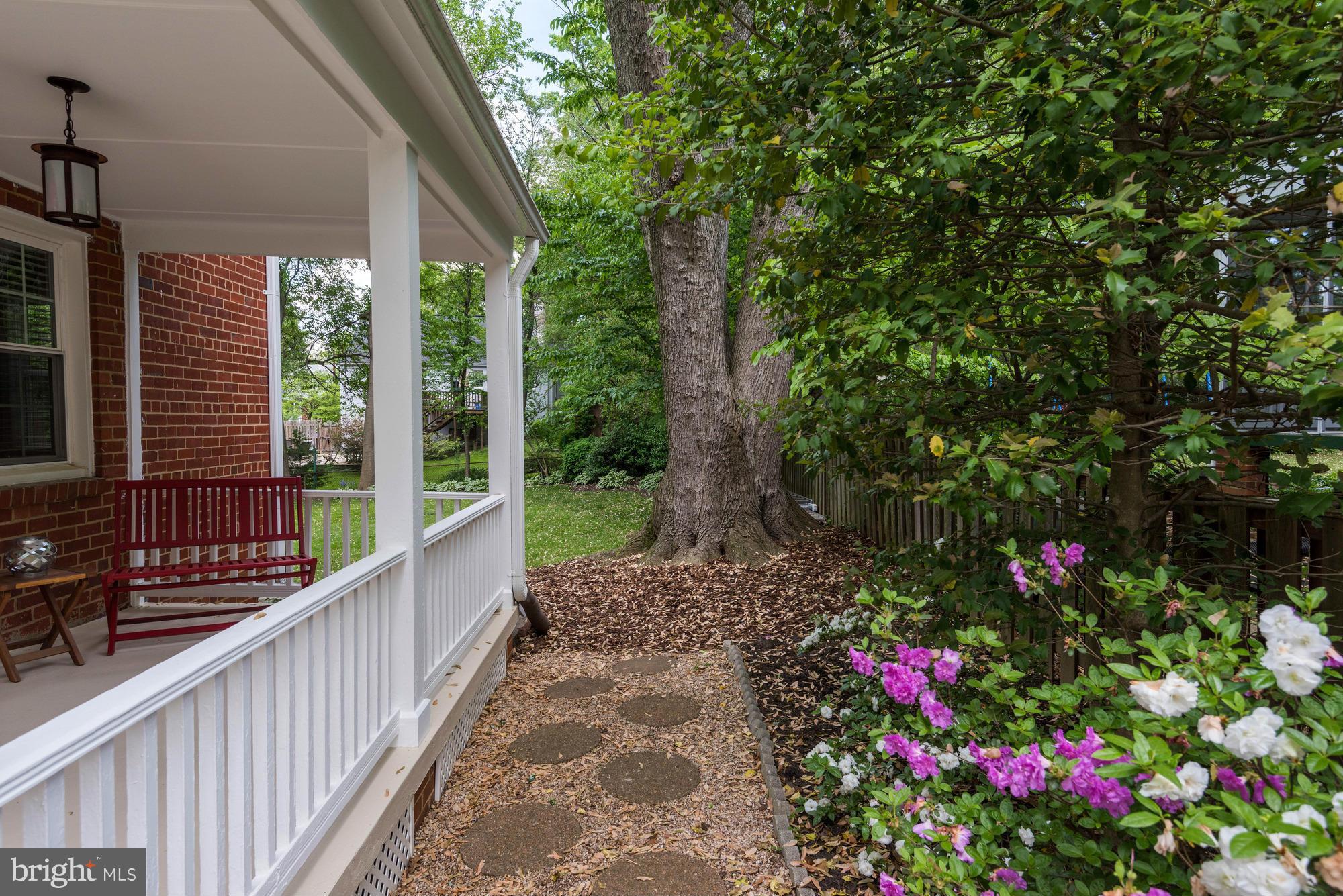9109 Eton Road Silver Spring, MD 20901 - Photo 26 of 30 a view of a pathway that has potted plants