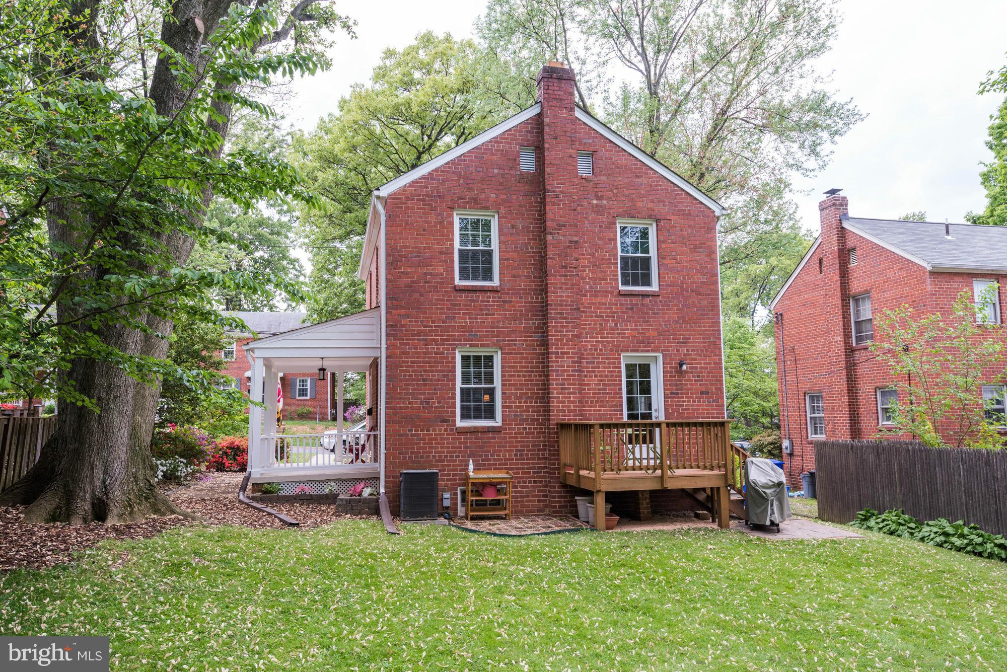 9109 Eton Road Silver Spring, MD 20901 - Photo 27 of 30 a house view with a sitting space and garden