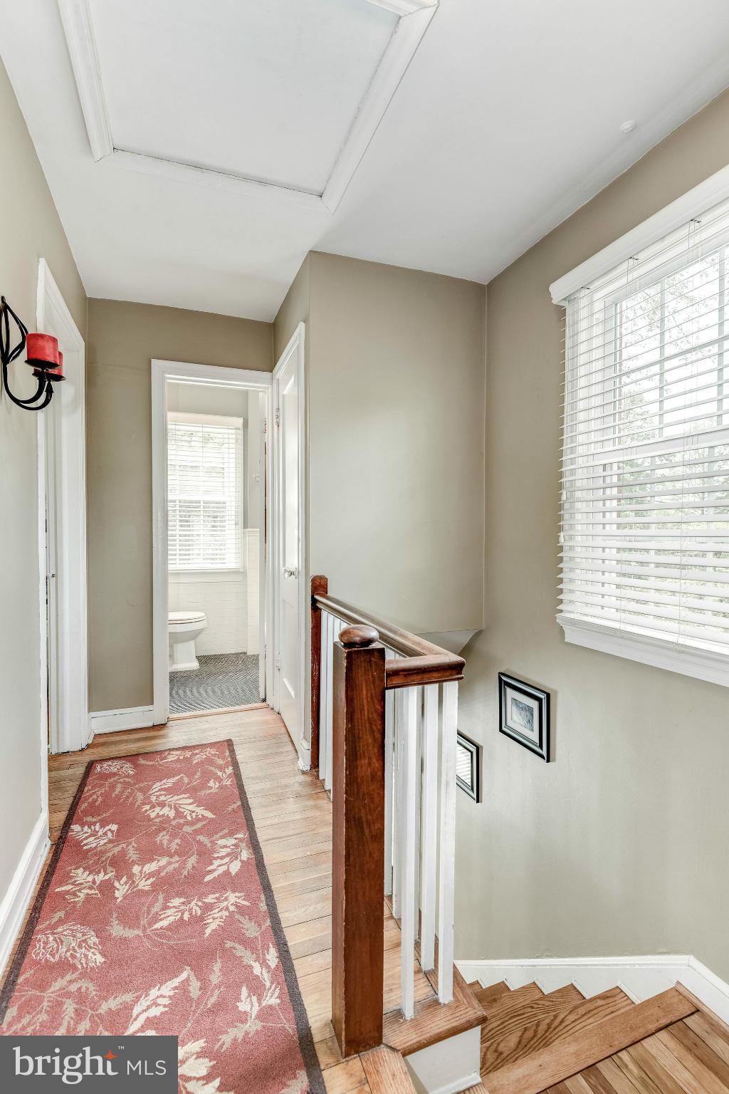 9109 Eton Road Silver Spring, MD 20901 - Photo 10 of 30 a bedroom with a bed and a window