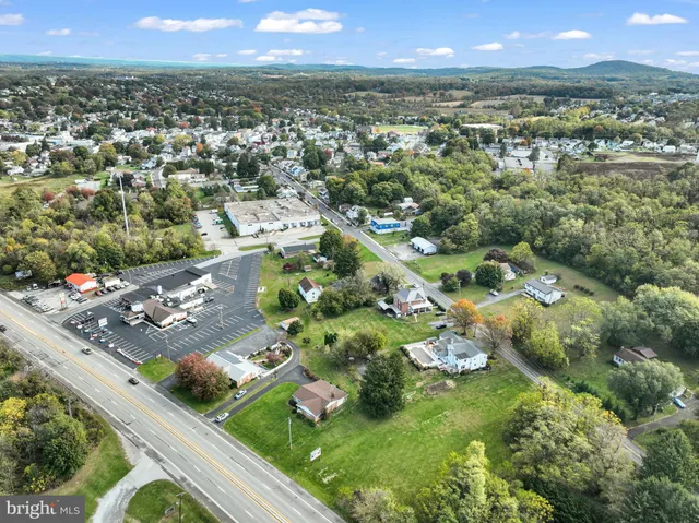 a view of a house with a big yard