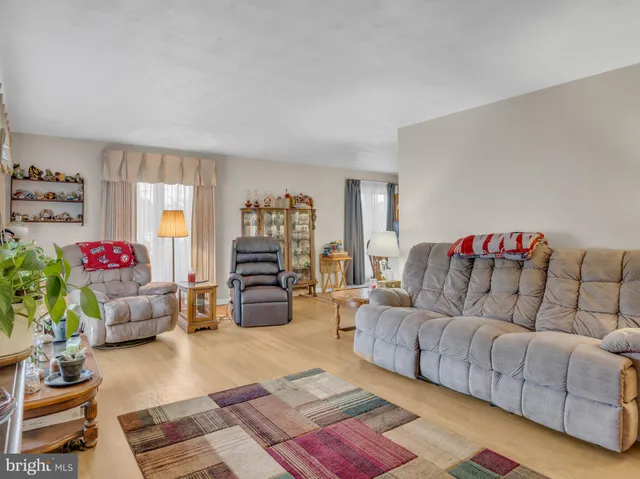 a living room with furniture and a couch