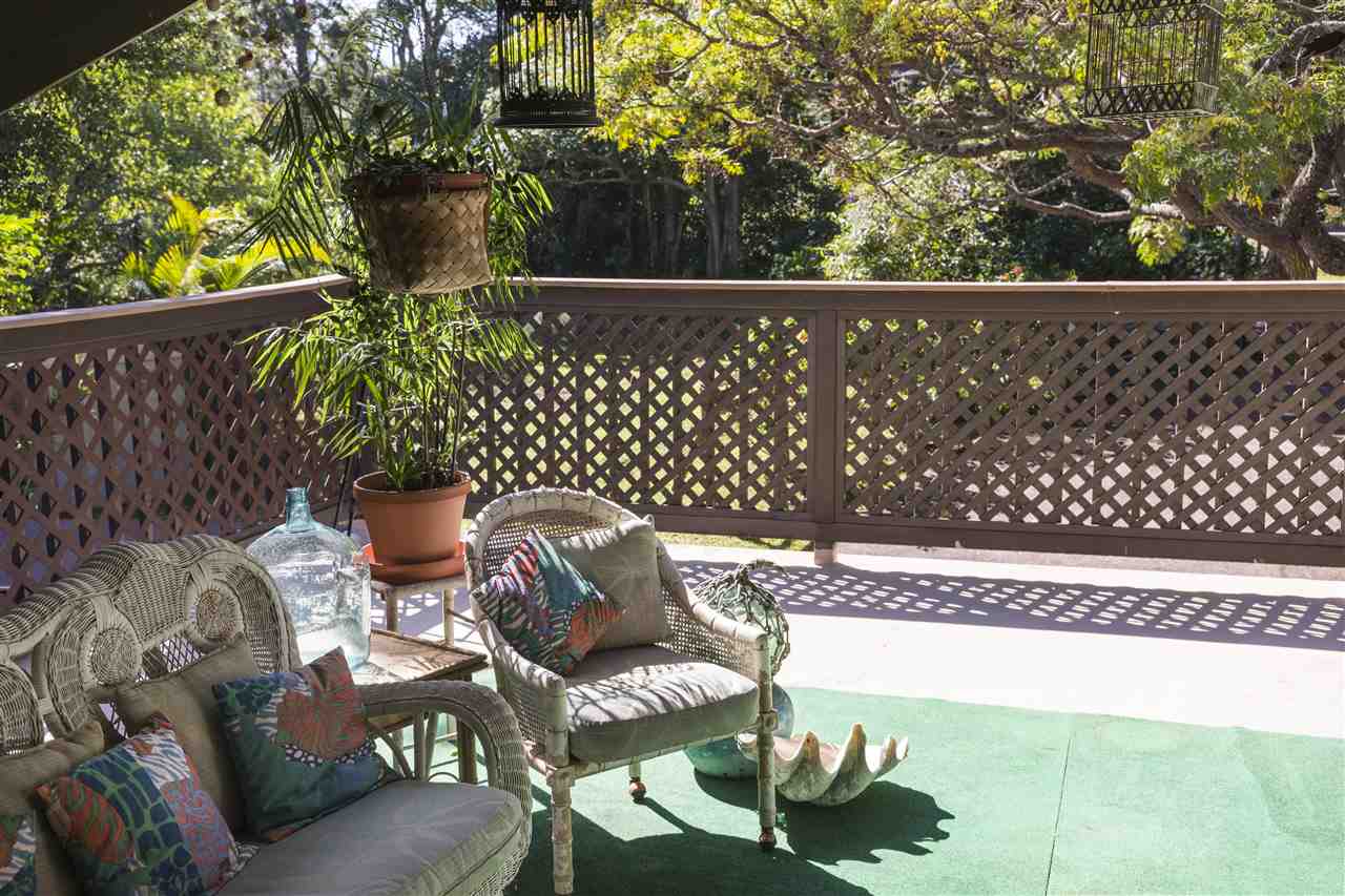 2555 Lemi Place Haiku, HI 96708 - Photo 18 of 30 a balcony with table and chairs