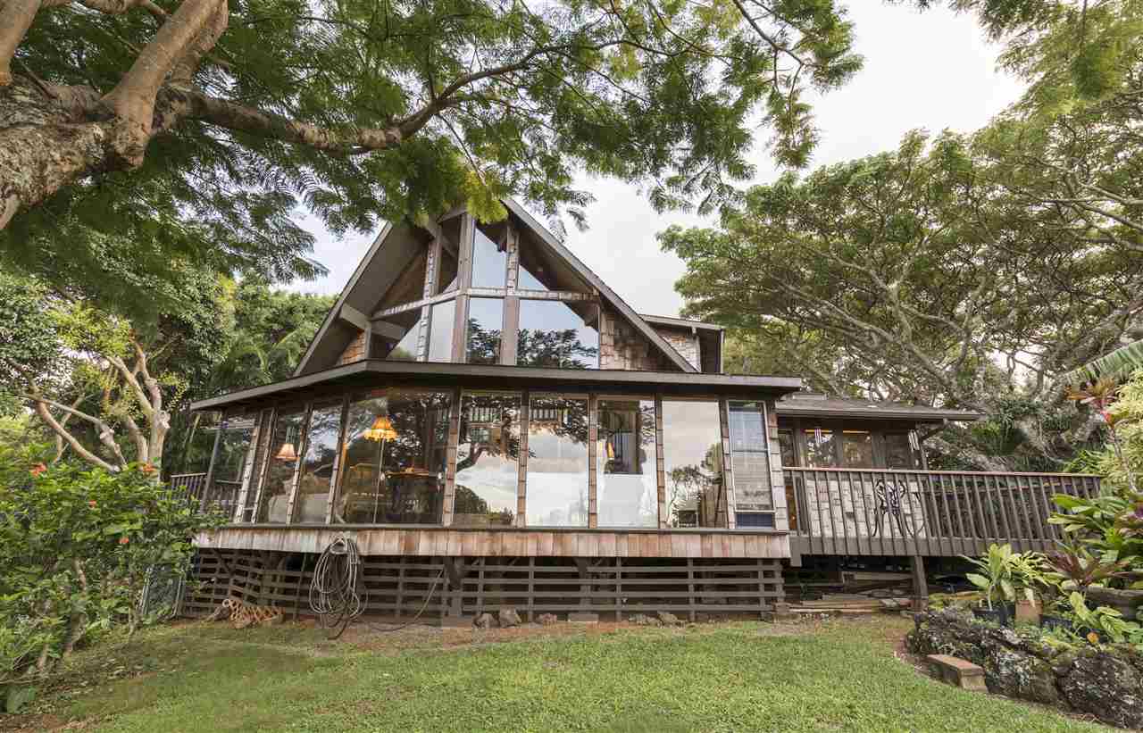 2555 Lemi Place Haiku, HI 96708 - Photo 21 of 30 a front view of a house with a yard