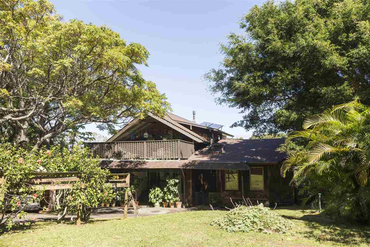 2555 Lemi Place Haiku, HI 96708 - Photo 4 of 30 a front view of a house with a yard