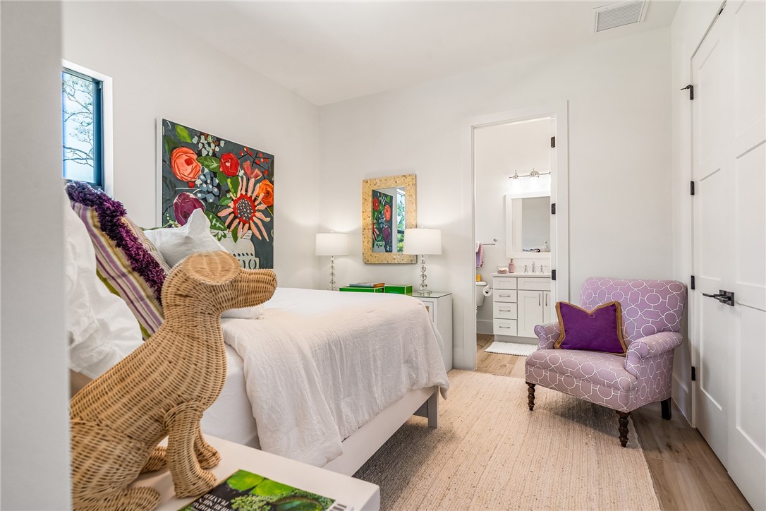 636 Cypress Road Vero Beach, FL 32963 - Photo 24 of 32 a bedroom with a bed and a couch