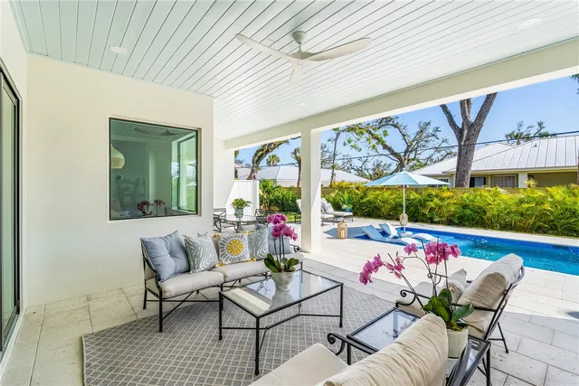 a outdoor living space with furniture and garden view