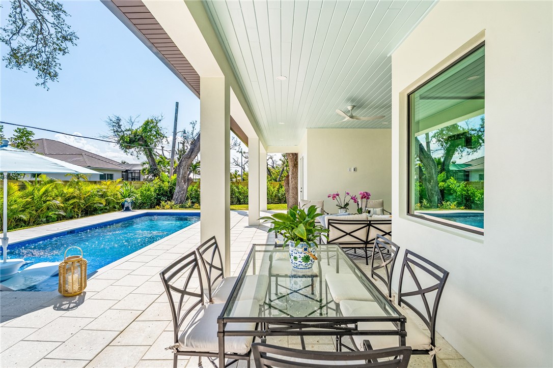 636 Cypress Road Vero Beach, FL 32963 - Photo 27 of 32 a view of an outdoor space with seating area
